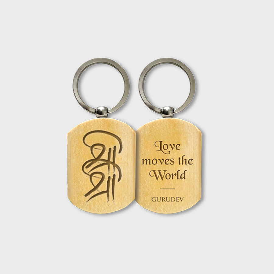 Sri Sri Wooden Keychain – Capsule